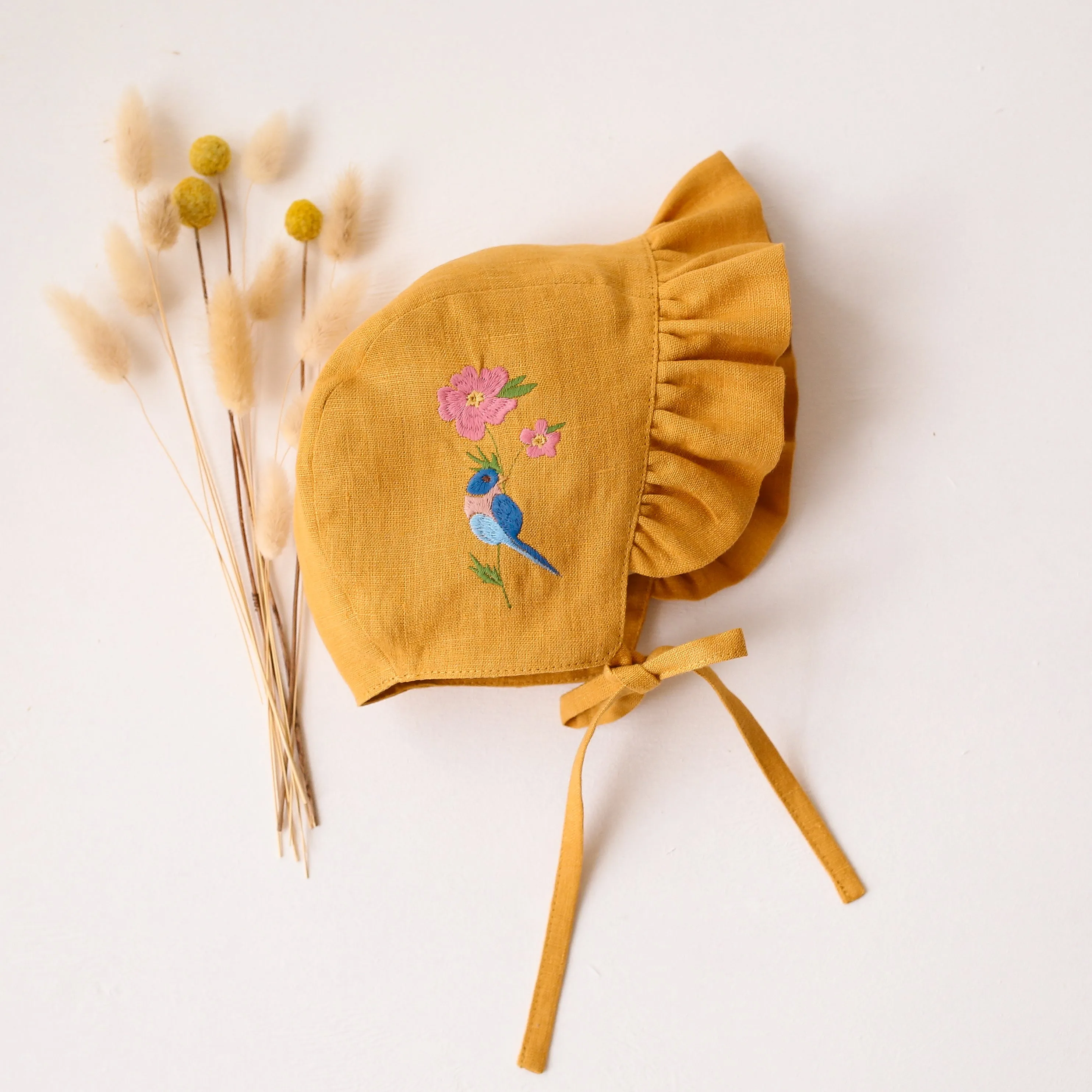 Amber Linen Ruffle Brimmed Bonnet with Bird on Flower Embroidery